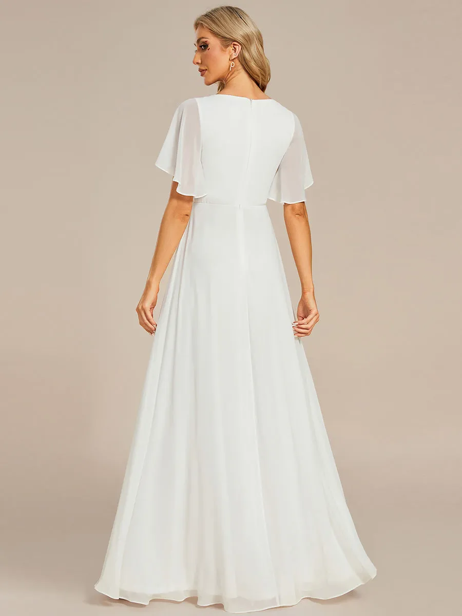Robe de soirée élégante en mousseline de soie avec manches flottantes