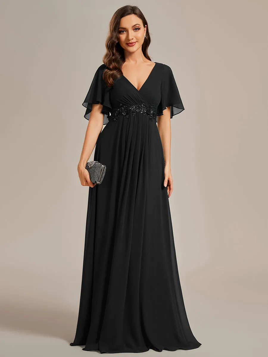 Robe de soirée élégante en mousseline de soie avec manches flottantes