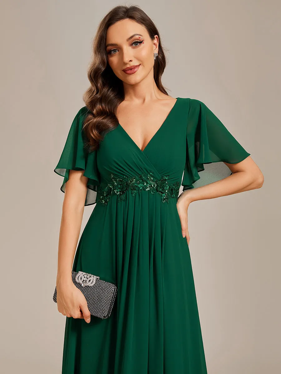 Robe de soirée élégante en mousseline de soie avec manches flottantes