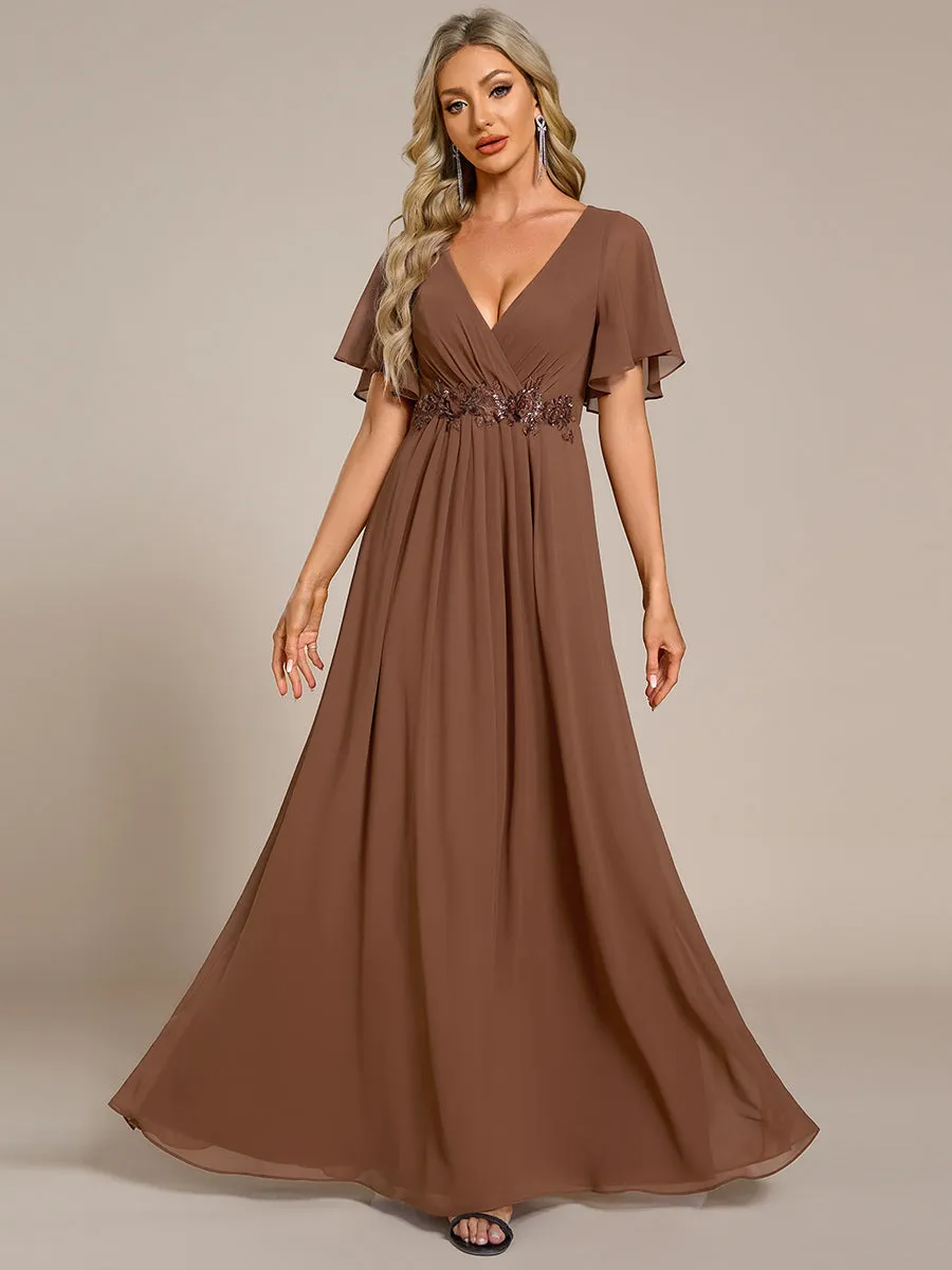 Robe de soirée élégante en mousseline de soie avec manches flottantes