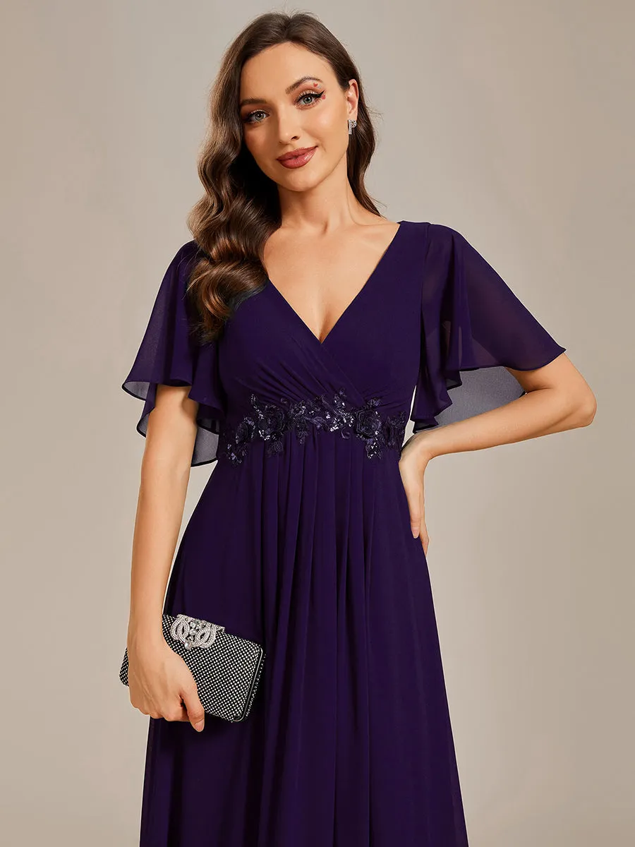 Robe de soirée élégante en mousseline de soie avec manches flottantes
