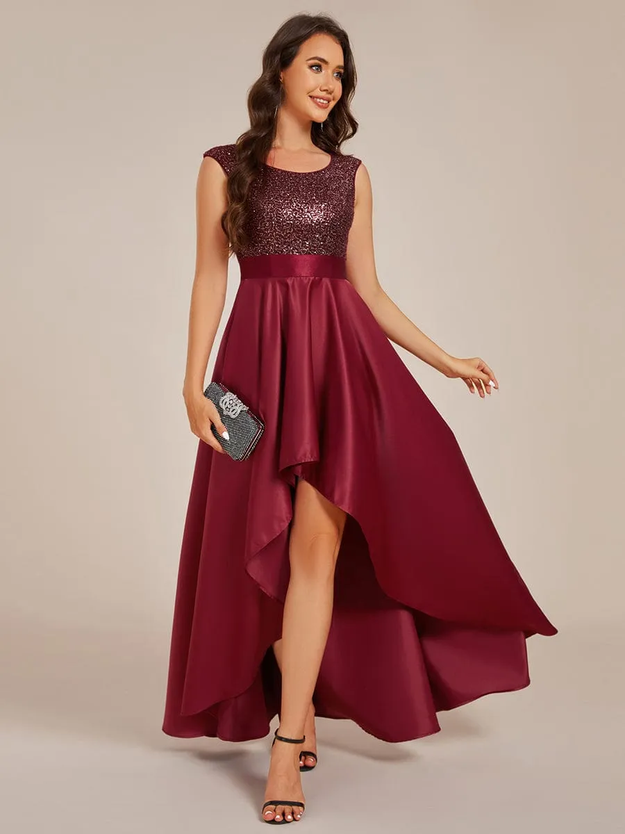 Robe de soirée à sequins et décolleté plongeant avec satin