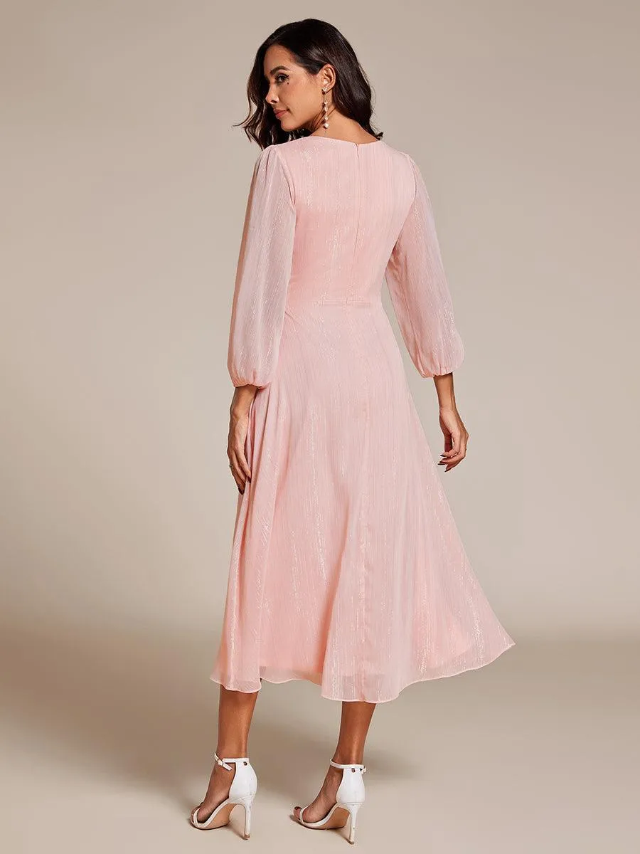 Robe de soirée trapèze scintillante à manches longues et col en V en mousseline de soie avec torsadé
