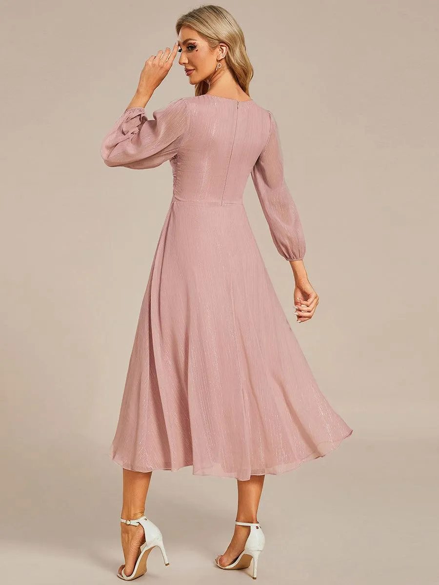Robe de soirée trapèze scintillante à manches longues et col en V en mousseline de soie avec torsadé